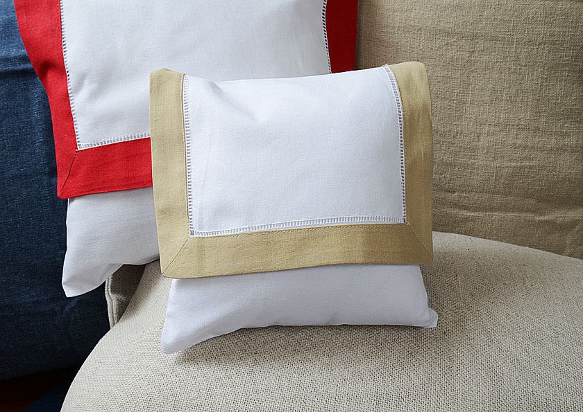 Baby envelope pillow, taupe colored trimmed